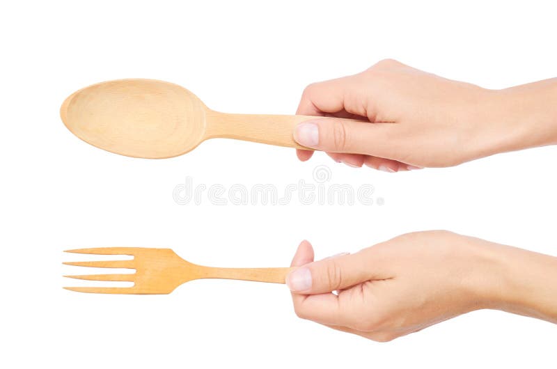 Wooden Fork and Spoon in Hand Isolated on White Background Stock Image
