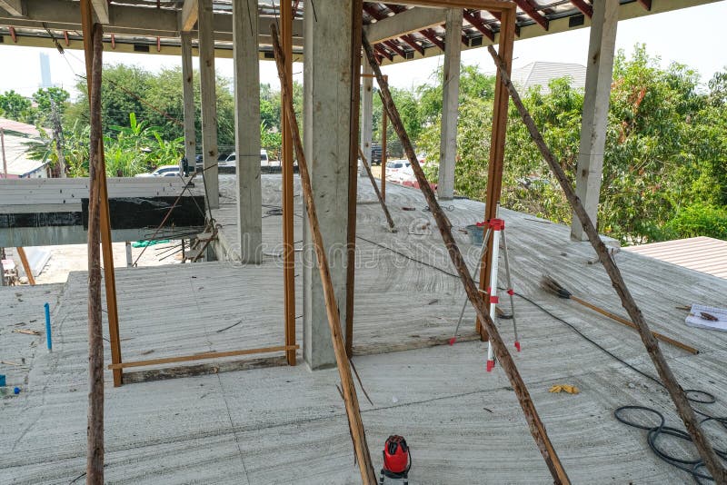 Wooden Frame Door Install on Concrete Prepare for Set with Wall on