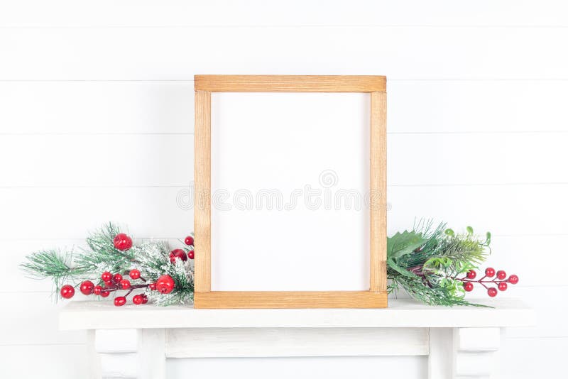 Wooden frame on a mantelpiece with branches - autumn theme