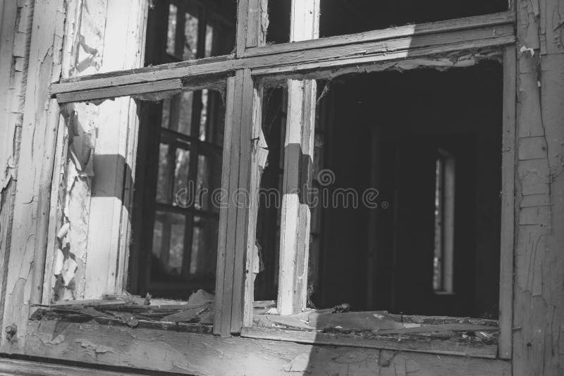 Wooden frames of broken windows in an abandoned house royalty free stock photos Wooden frames of broken windows in an abandoned house royalty free stock photos