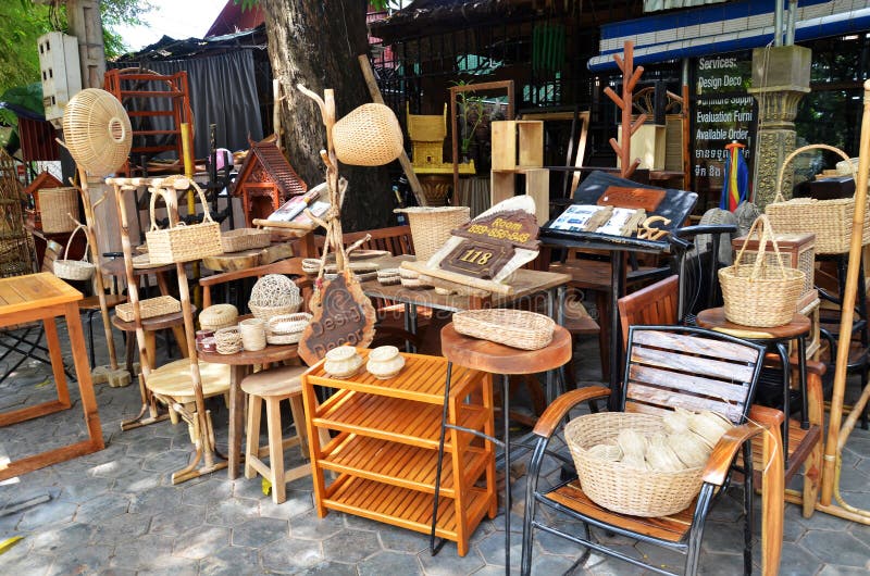 Wooden furniture outside their shop. Wooden furniture outside their furniture business in Siem Reap, Cambodia stock image