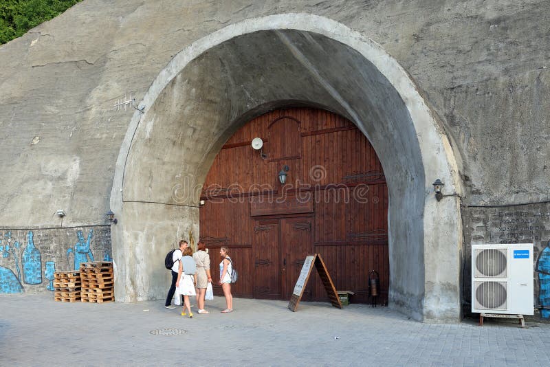 Wooden gate of wine shop Grotto and warehouses in the village of Abrau Durso in the vicinity of Novorossiysk stock photos Wooden gate of wine shop Grotto and warehouses in the village of Abrau Durso in the vicinity of Novorossiysk stock photos