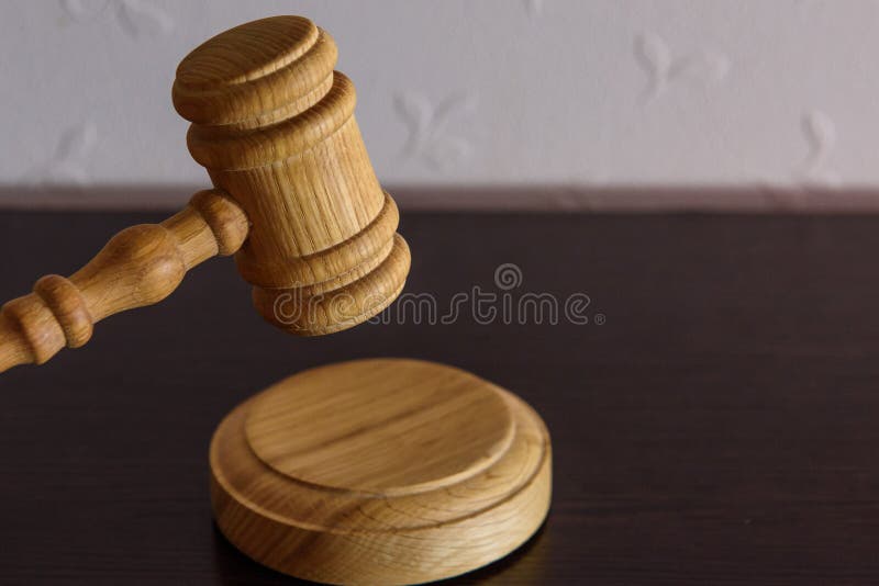 Wooden gavel, judge hammer on wooden background stock images Wooden gavel, judge hammer on wooden background stock images