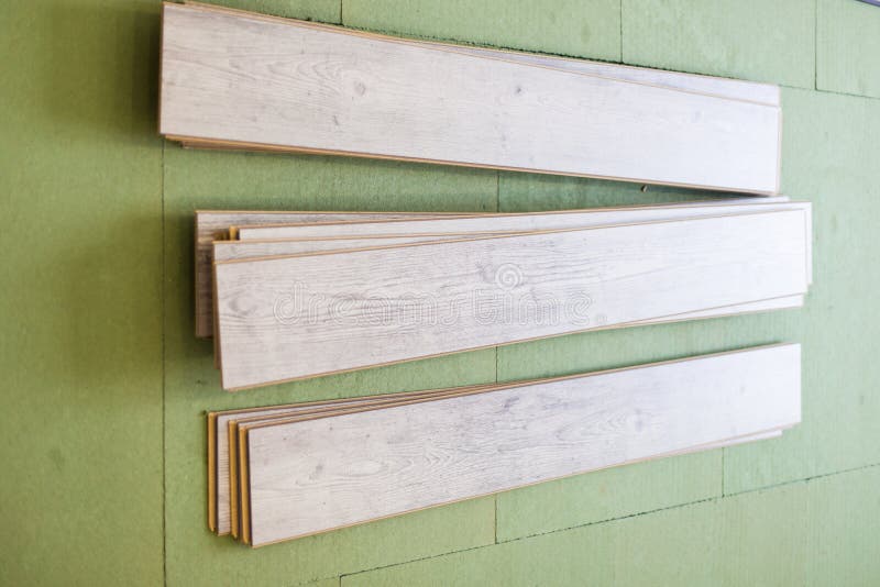 Wooden Gray Panels on New Laminated Flooring before Install Stock Image