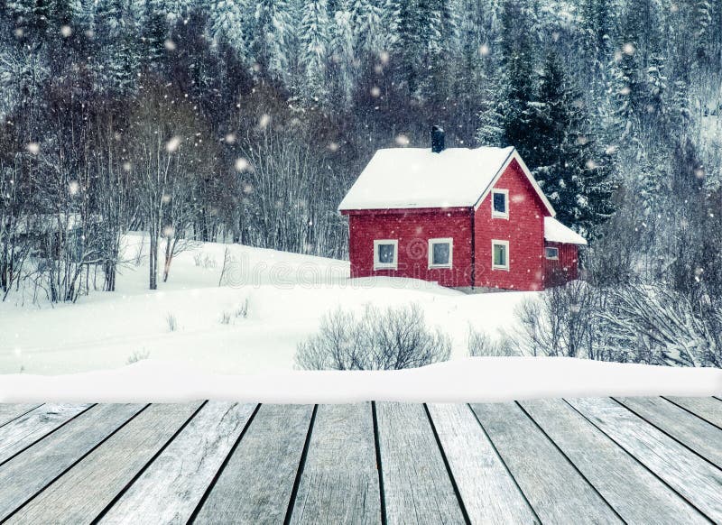 Wooden gray with red house in snowing on winter royalty free stock photo Wooden gray with red house in snowing on winter royalty free stock photo