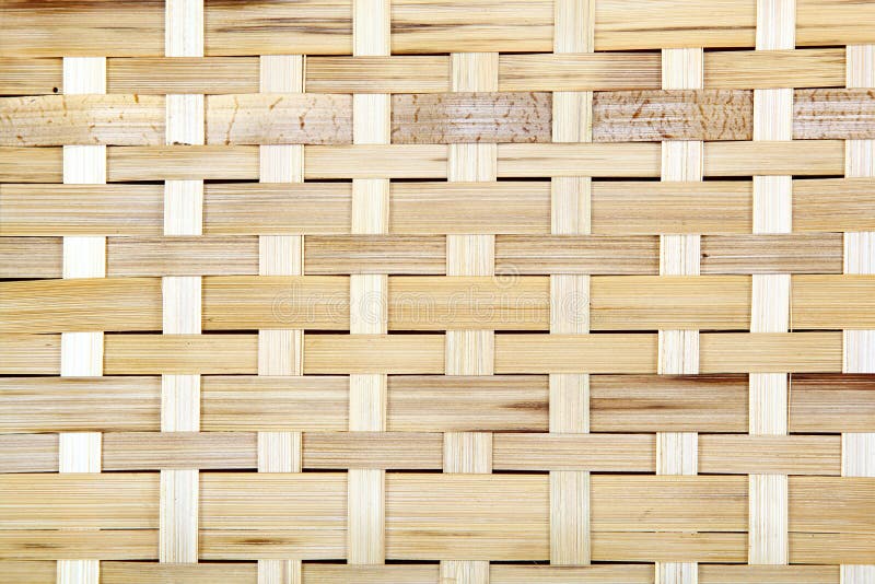 Wooden grid, the background of woven wood. Bamboo wood texture