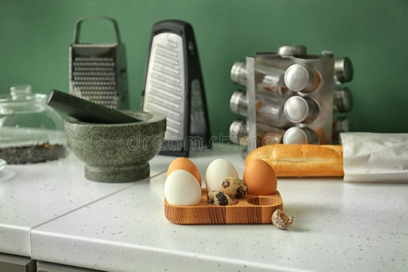 Wooden Holder with Chicken Eggs on Kitchen Table Stock Image Image of stand, form 151114425