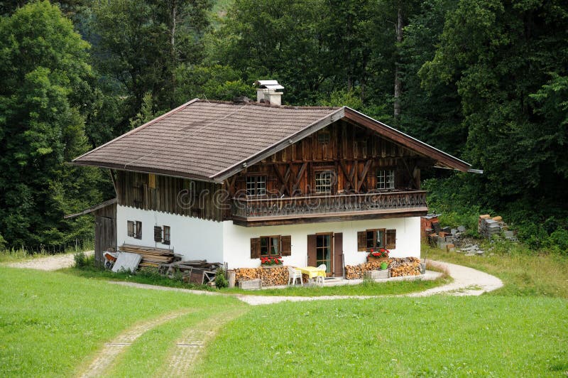 Wooden house in the Alps stock photo. Image of building 10452494