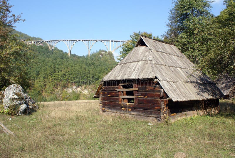 Wooden hut and bridge stock photos