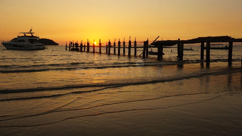 wooden jetty in the sunset