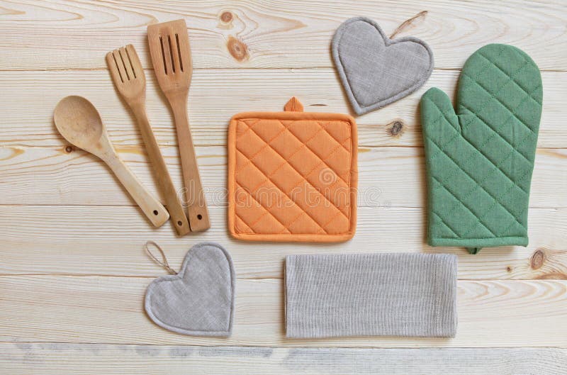 Wooden Kitchen Utensils,potholder, Glove and Napkin on Wooden T Stock
