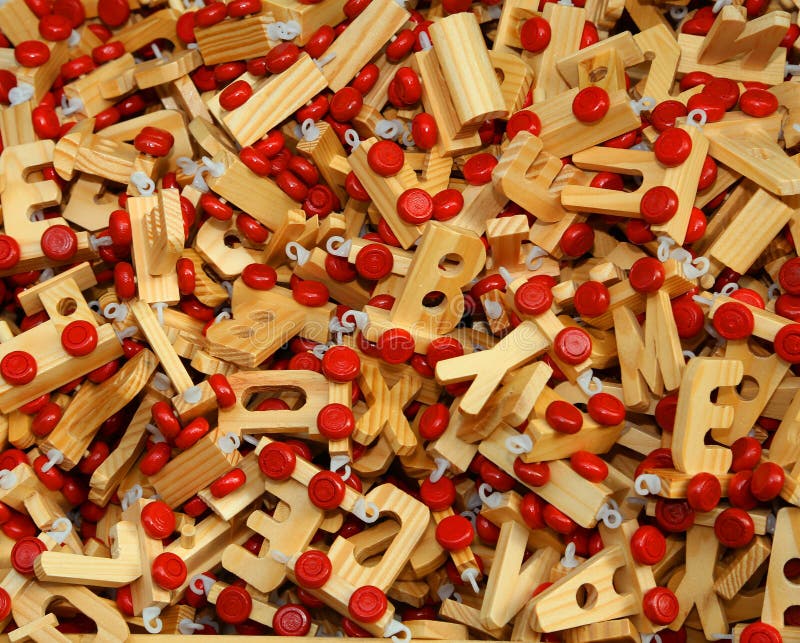 Wooden Letters To Make Words by Putting Them in a Row Stock Photo