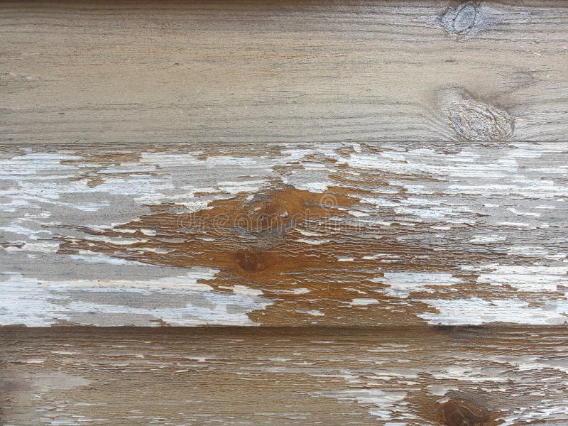 Wooden Masonry with Peeling Paint from Weather Conditions Stock Photo