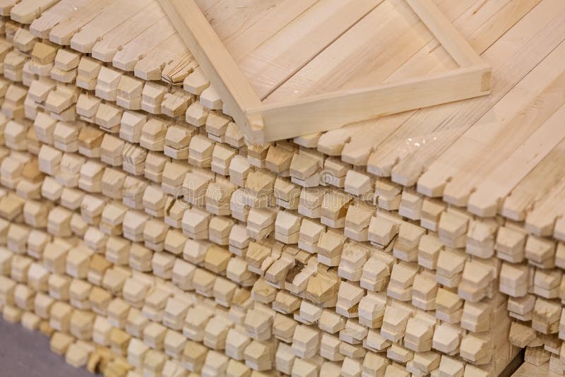 Processed wooden moldings stock photo. Image of brown 85039638