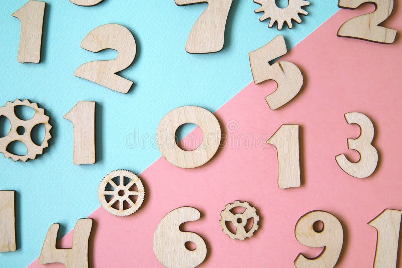 Wooden Numbers on Pastel Colored Background Stock Image - Image of