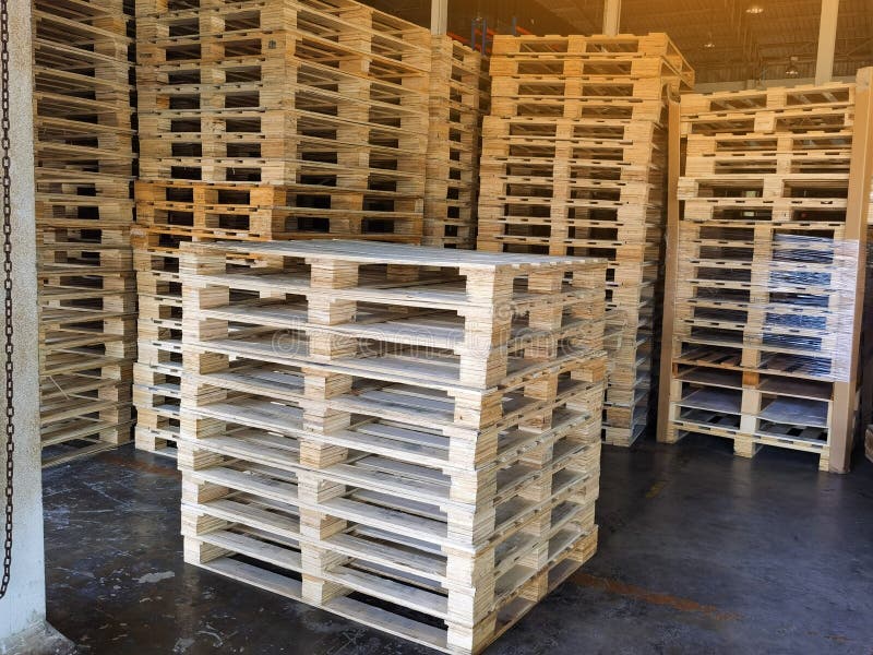 Wooden Pallets Stack At The Freight Cargo Warehouse For Transportation