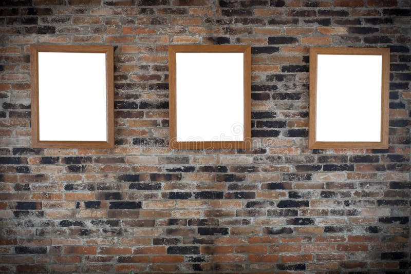 Wooden photo frames on wall