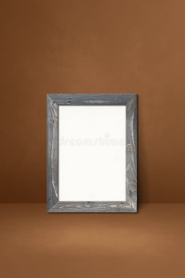 Wooden Picture Frame Leaning on a Brown Wall Stock Image Image of