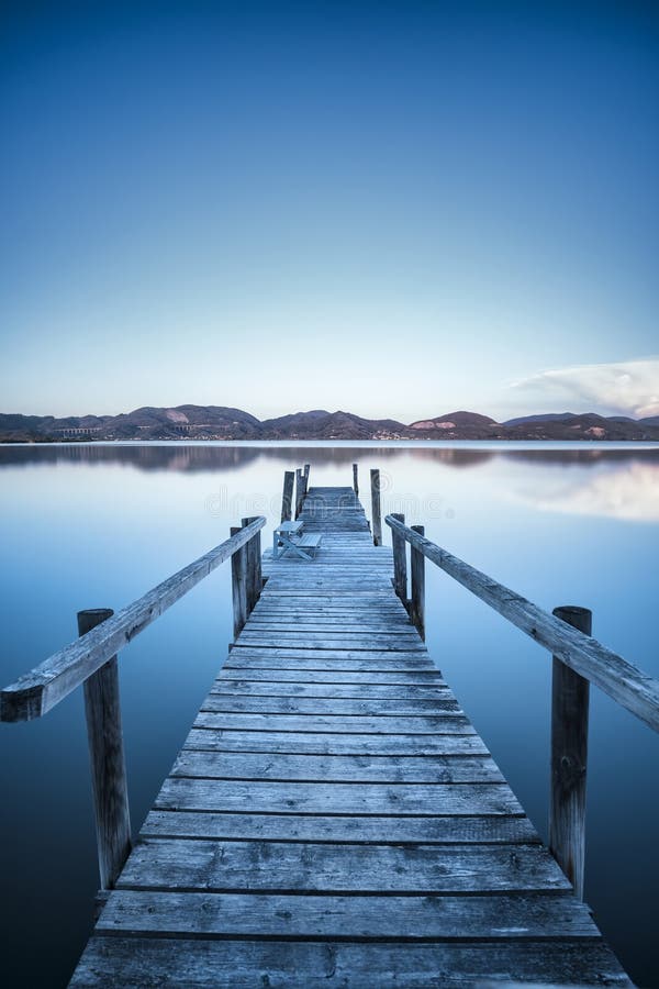 Pier or Jetty Silhouette in a Foggy Lake. Garda Lake, Italy Stock Photo ...