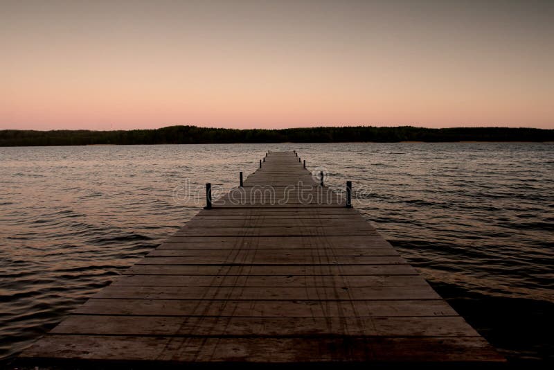 Wooden pier near water edge