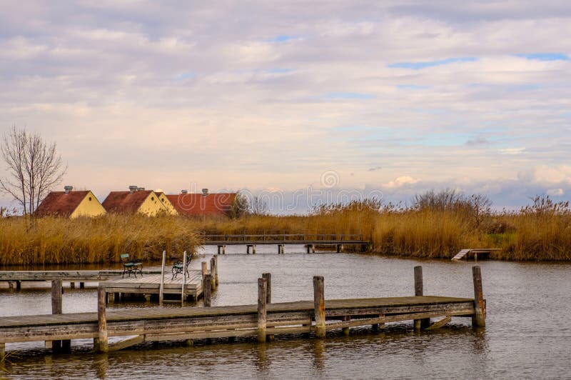 Wooden piers in Neusiedler See in town Rust in Burgenland, Austria. Wooden piers in Neusiedler See in town Rust in Burgenland, Austria