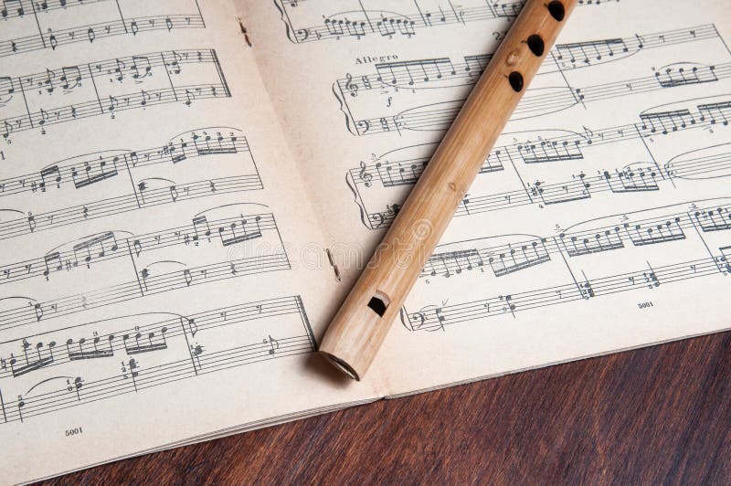 Wooden Pipe on the Background of Musical Notes Stock Photo - Image of  fakir, audio: 176639666