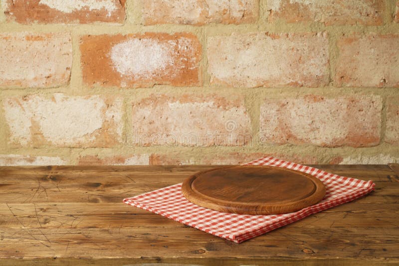Wooden Pizza Tray On Table With Tablecloth Over Brick Wall Background Stock Image Image Of Food Advertise 134454441