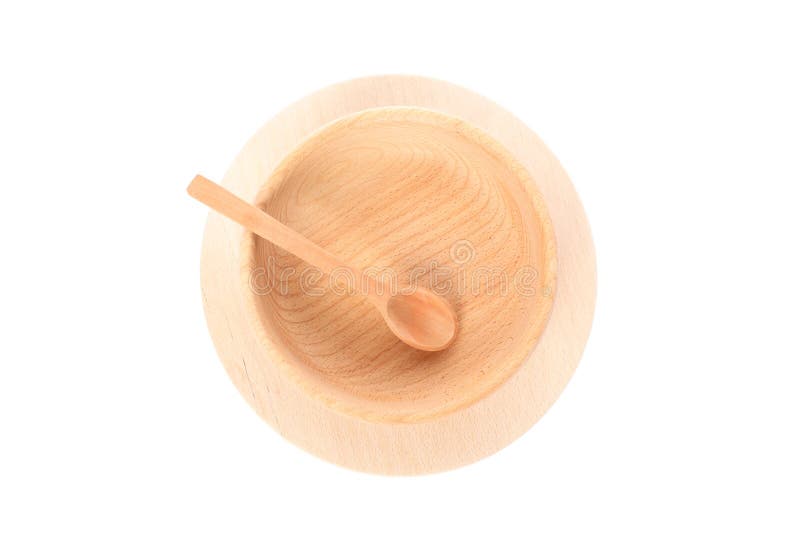 Wooden plate, bowl and spoon isolated