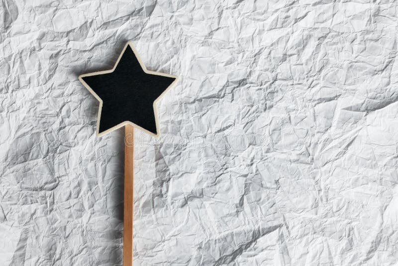 Wooden pointer in the shape of a star