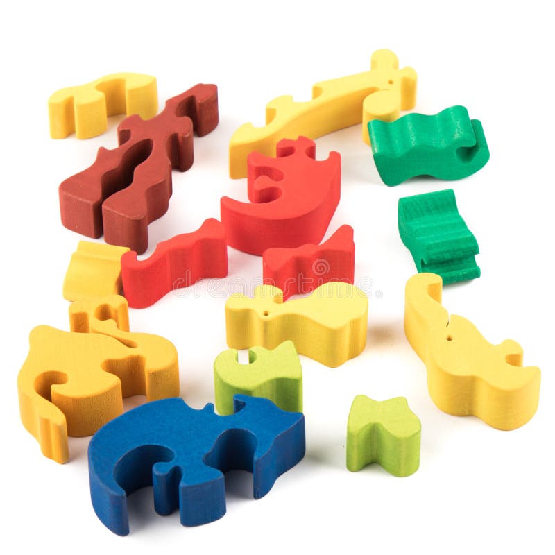 Wooden puzzle pieces stock photo. Image of learning, group 66604970