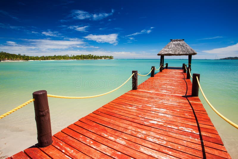 Wooden Red Jetty Extending To Tropical Lagoon Stock Photo - Image of ...
