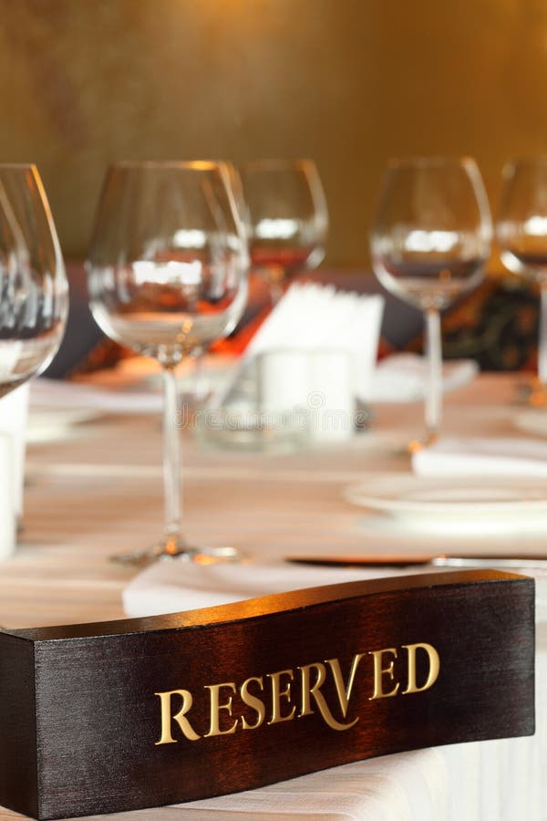 Wooden Reserved Plate On Restaurant Table Stock Image 
