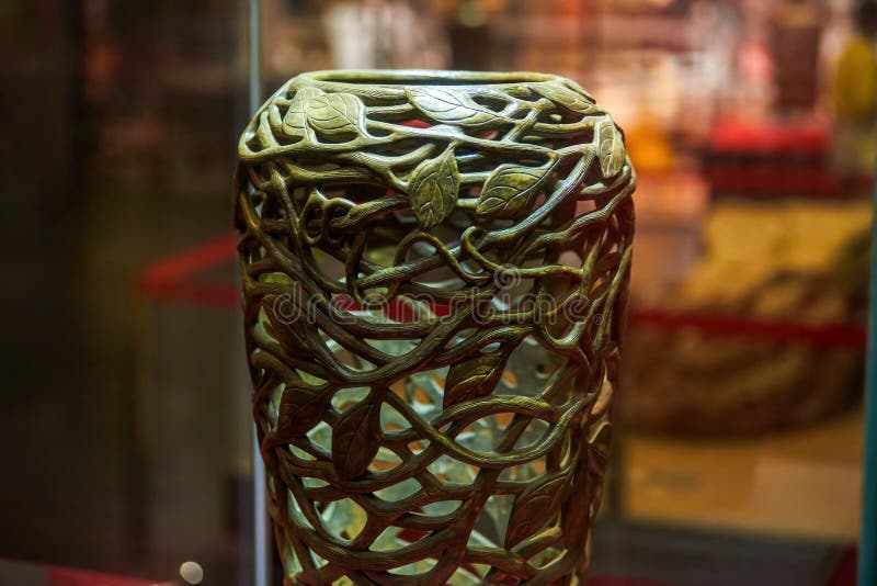 Wooden root carved vase in the museum stock photography