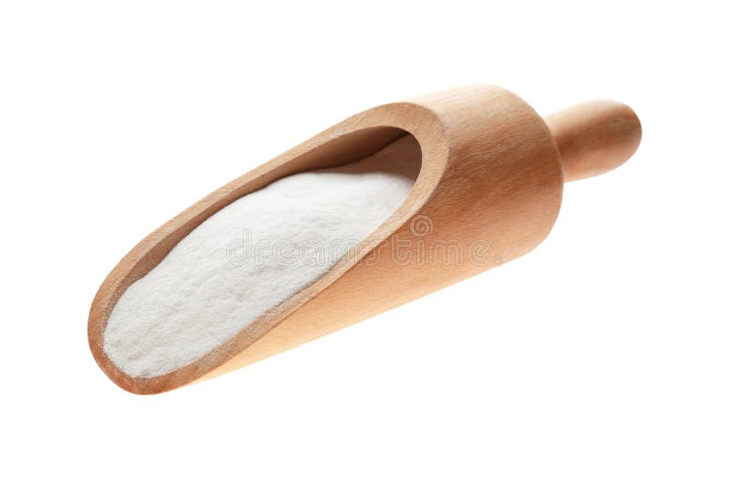 Wooden scoop of baking soda isolated on white