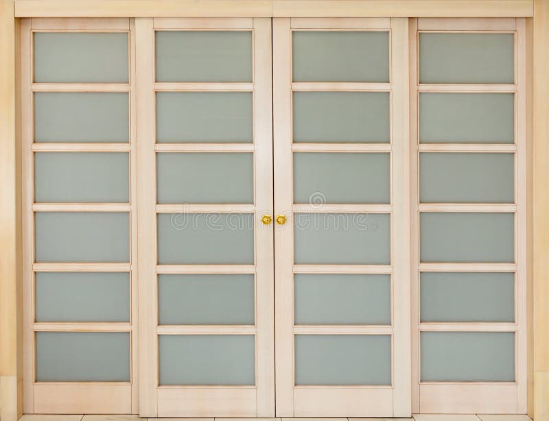 Wooden sliding door with glass inserts. royalty free stock photos Wooden sliding door with glass inserts. royalty free stock photos