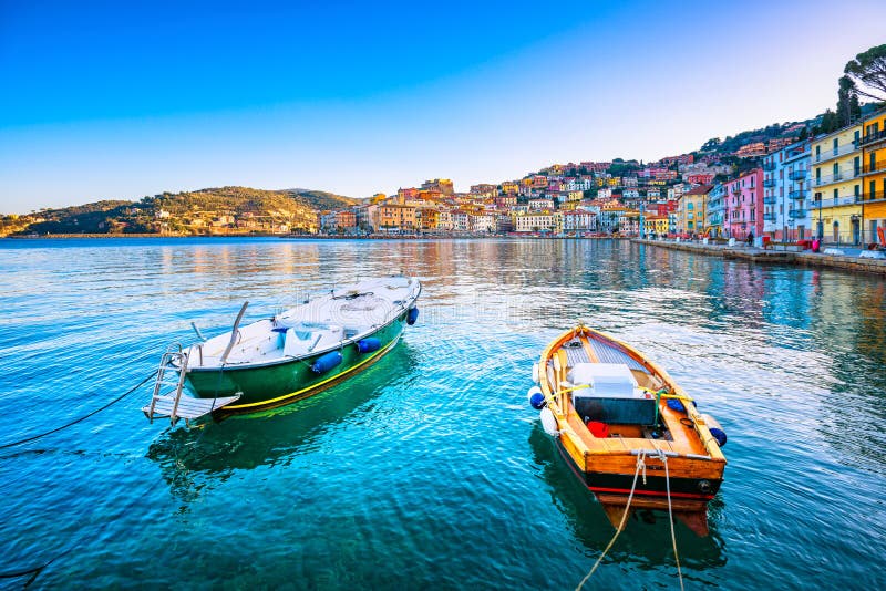 Wooden small boats in Porto Santo Stefano seafront. Argentario