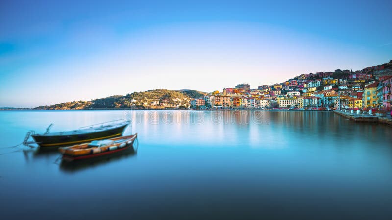 Wooden small boats in Porto Santo Stefano seafront. Argentario