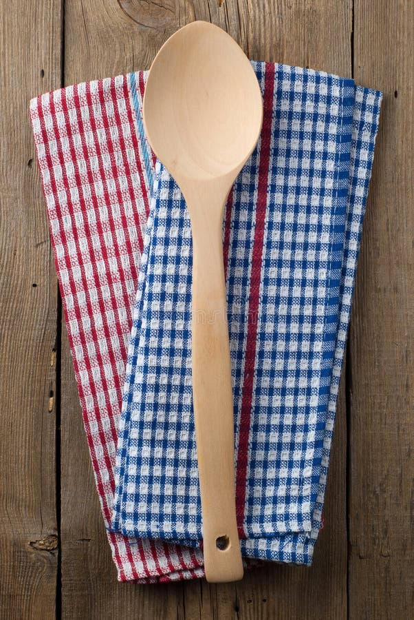 Wooden Spoon And Dish Towels Stock Photo Image of brown, kitchenware