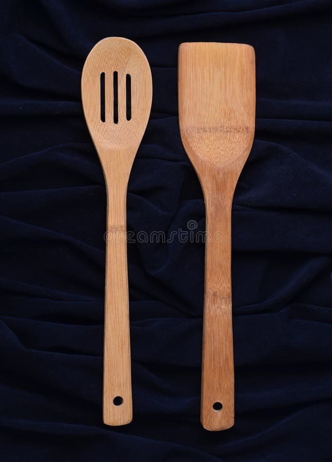 Wooden Spoon and a Spatula on a Black Background. Stock Image Image of kitchen, bakery 108123807