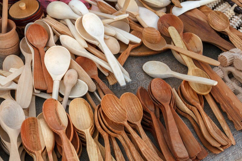 Wooden Spoons are Handmade at the Fair, Prepared for Sale. Stock Photo
