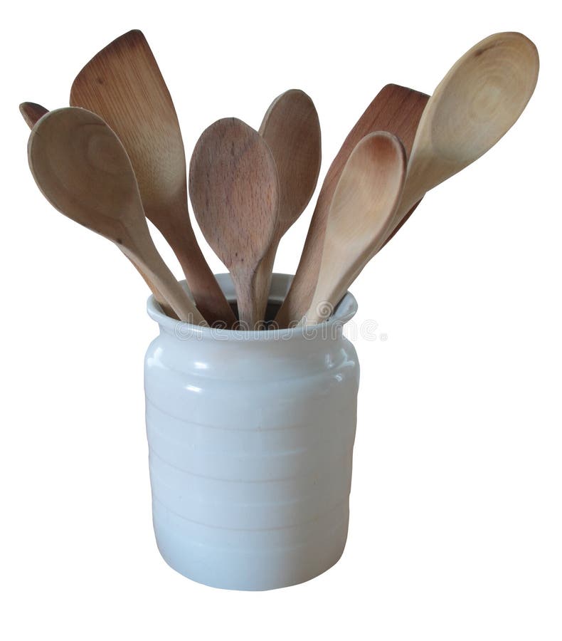 Wooden spoons in white jug