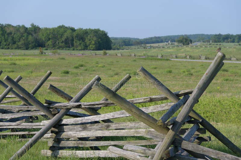 Wooden stacked fence. Gettysburg battlefield in the background. Pennsylvania stock image