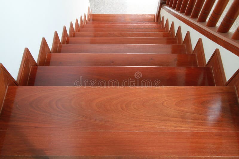 Wooden stairs and handrail stock photo