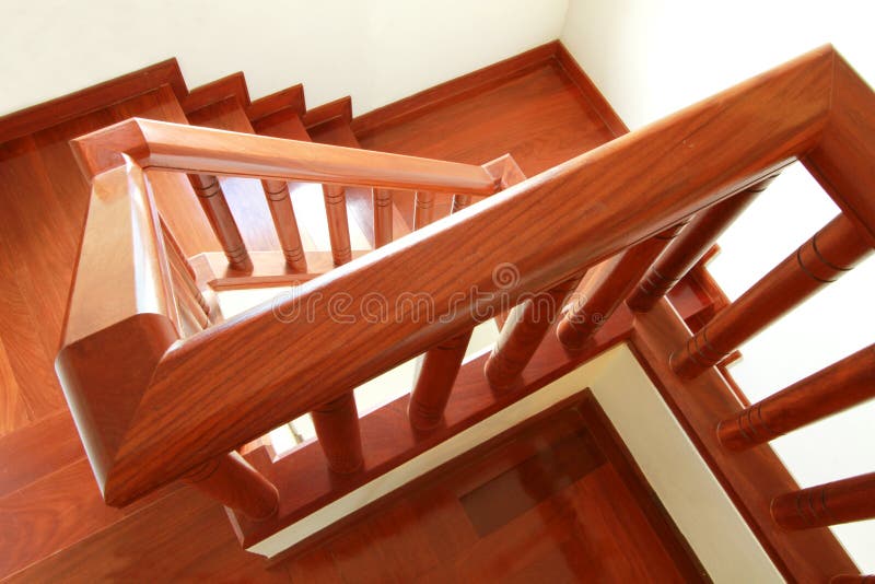 Wooden stairs and handrail royalty free stock photo