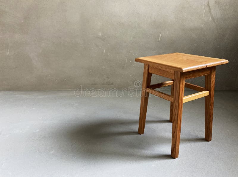 Wooden stool in room stock photo. Image of grey, closeup 198585680