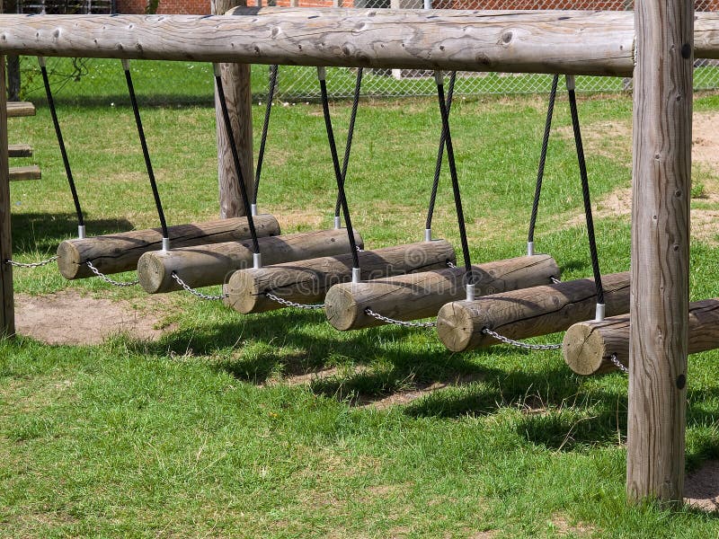 Wooden swings in a playground