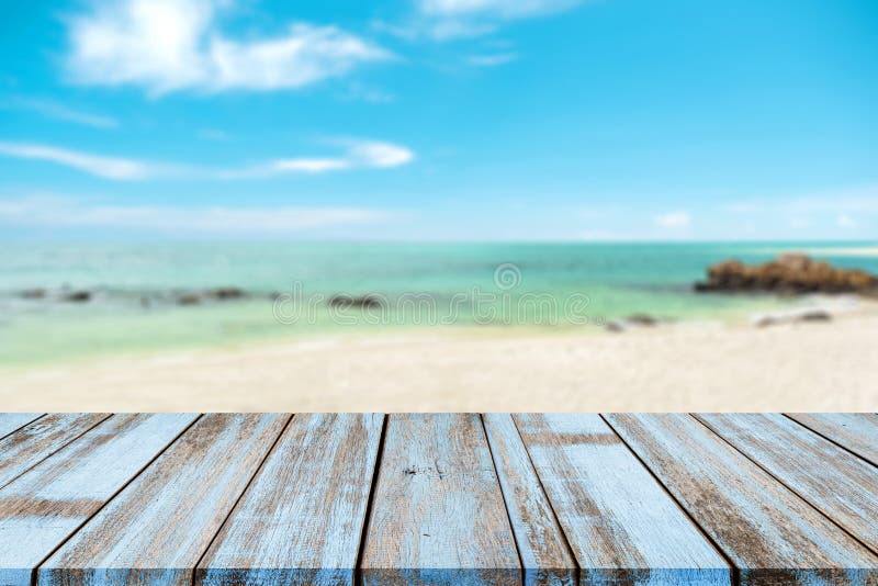 Wooden Table Â top with Blurred Natural Sea of Tropical Beach and Blue Sky,  Summer Holiday Background Ideas for Display Stock Photo - Image of product,  beautiful: 183282754