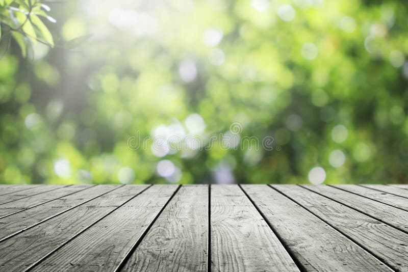 Wooden Table and Blurred Fresh Garden Nature Bokeh Background. Stock Image  - Image of season, display: 179189341
