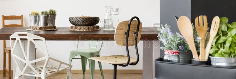 Wooden table, chairs and kitchen utensils stock photos Wooden table, chairs and kitchen utensils stock photos