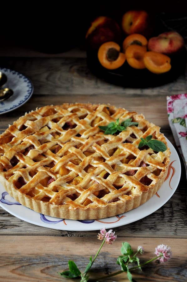 A plate a pie with apricots. Closeup stock images A plate a pie with apricots. Closeup stock images
